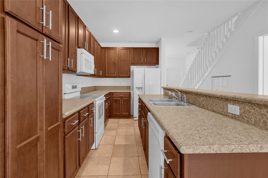 This 2016-built townhouse offers a spacious and functional layout featuring 2 bedrooms, 2.5 bathrooms, and approximately 1,454 square feet of living space. Designed for both comfort and convenience, the home includes two upstairs primary suites, each with a private full bath and walk-in closets, providing excellent flexibility for homeowners or investors. The main level features an open-concept living and dining area, complemented by an eat-in kitchen with ample cabinetry, pantry storage, and a snack bar—ideal for everyday living or casual entertaining. A versatile den or family room adds additional living space, perfect for a home office, media room, or flex area. A guest half bath completes the first floor.Additional highlights include upstairs laundry, assigned parking plus guest spaces, volume ceilings, and a private patio/screened porch offering outdoor enjoyment and storage. The property is located within a gated, pet-friendly community with exceptionally low monthly HOA fees, which include exterior maintenance, landscaping, roof repairs, and common amenities.Ideally situated near Florida’s Turnpike, I-95, and the Sawgrass Expressway, St. Moritz offers convenient access to major commuting routes, shopping, dining, and entertainment—including Sawgrass Mills Mall. Investor-friendly with leasing permitted, this property presents a strong opportunity for both owner-occupants and investors seeking value, location, and low maintenance living.