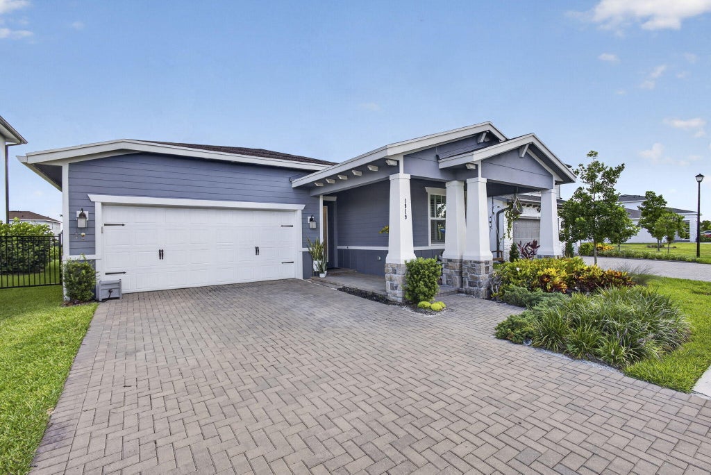 Photo of 1919 Wandering Willow Way, The Acreage, FL 33470 (MLS # B26047006)