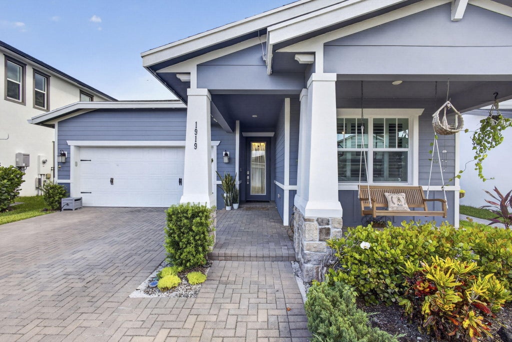 Photo of 1919 Wandering Willow Way, The Acreage, FL 33470 (MLS # B26047006)