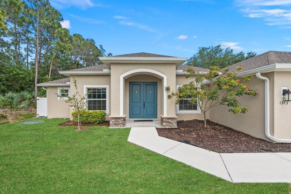 Photo of 1373 SE Proctor Lane, Port Saint Lucie, FL 34983 (MLS # R10981534)