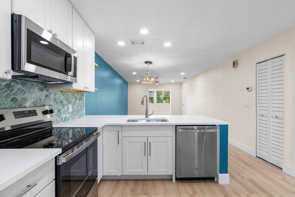 Photo of 256 Lake Meryl Drive, West Palm Beach, FL 33411 (MLS # R11158703)