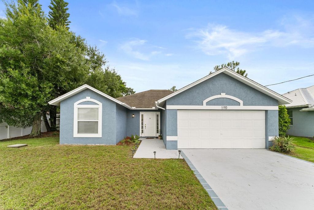 Photo of 590 SW Jeanne Avenue, Port Saint Lucie, FL 34953 (MLS # R11125105)