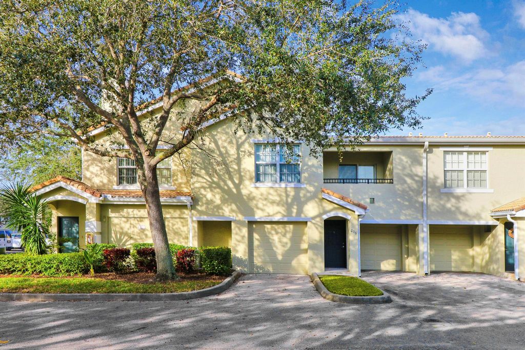 Photo of 154 SW Peacock Boulevard #28-101, Port Saint Lucie, FL 34986 (MLS # R10994720)