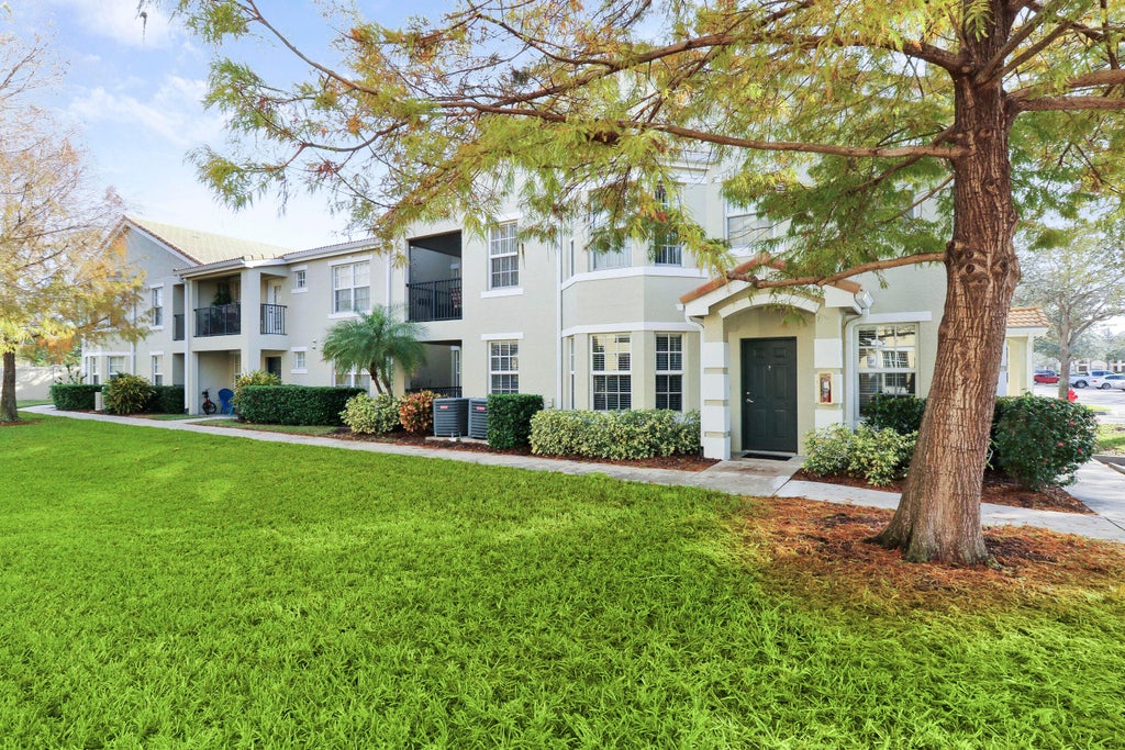 Photo of 154 SW Peacock Boulevard #28-101, Port Saint Lucie, FL 34986 (MLS # R10994720)