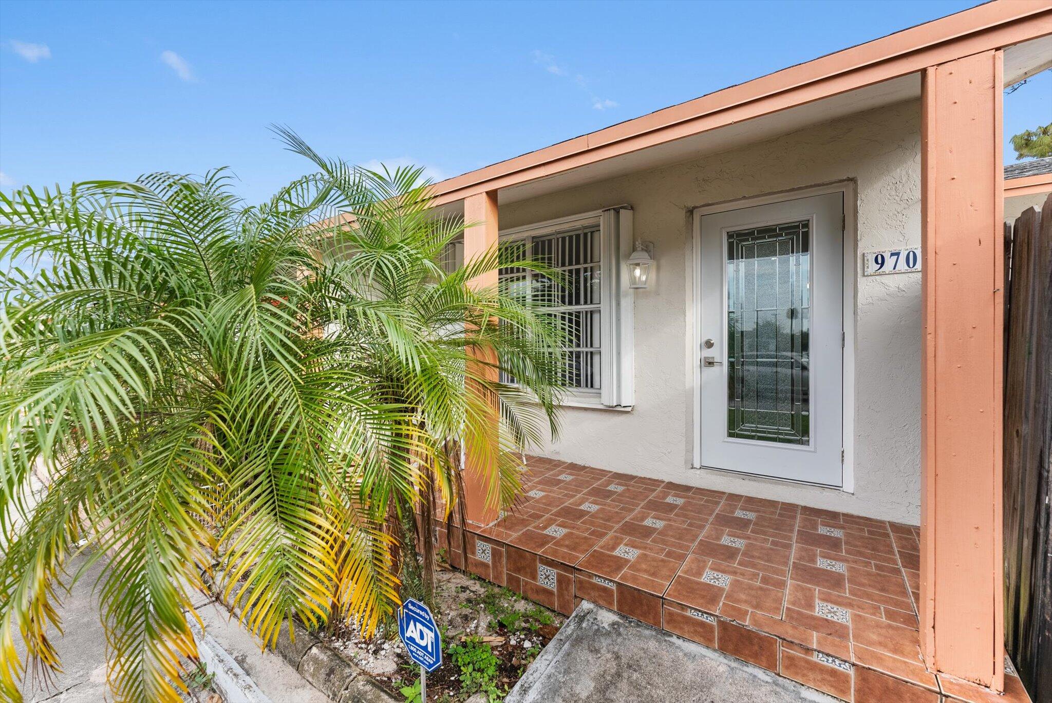 Charming 1-bed, 1-bath retreat spanning over 802 total sq ft. Massive enclosed Florida room with a mini split A/C system, can be used as another bedroom, an office, a man cave or work studio! Fully fenced for ultimate privacy, the property boasts a vast, tranquil yard perfect for relaxing or hosting parties. Ample guest parking available. Conveniently located near major supermarkets, banks, airport, beach, and downtown West Palm Beach. Your private haven with easy access to essential amenities and the vibrant city life. Schedule a tour before it is too late!