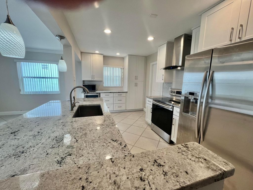 Photo of 2391 SW 11th Avenue, Boynton Beach, FL 33426 (MLS # R11053666)