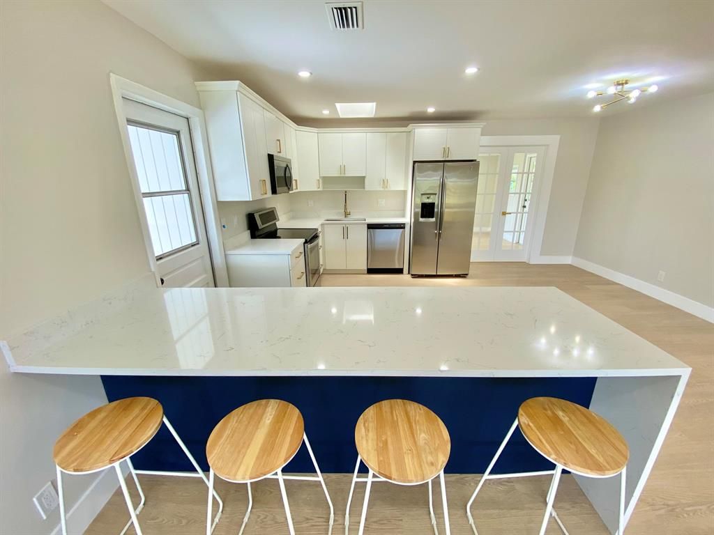 Photo of 551 Palmetto Drive, Lake Park, FL 33403 (MLS # R10808002)