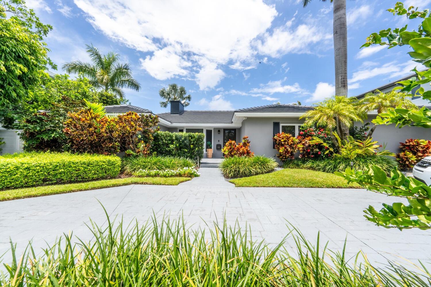 Finally, the home you have been looking for, single story beauty! Lowest priced home in prestigious Seven Isles, the only guard patrolled neighborhood in the Las Olas Isles. 87' of prime deepwater dockage, no fixed bridges, ocean access. Impeccably maintained, impact windows/doors, roof 2016, water heater 2021, A/C 2024, generator, 4/3, formal living room with fireplace, large formal dining room. Cooks kitchen with 2021 Viking appliances opening to family room. Fourth bedroom is a separate guest suite & private bath. Tropical landscaping provides privacy to enjoy your summer kitchen and heated pool, retractable awning for extra shade. Circular driveway providing ample parking. Minutes, to the beach, downtown, shops, restaurants, airport and major highways. Come live the Las Olas Lifestyle!