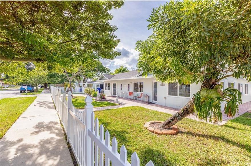 Two separate houses each with their own fenced in yards sitting on a total land size of 14,700 sq. ft lot. Package
deal to be sold together. Main house has 3 bed 2 bath completely updated, and the other has 1 bed 1 bath with tile floors in living and bedrooms, wood floors in kitchen, two central NEW A/C units in main house with two front door entry's. Large Master, huge walk in closet and oversized bathroom suite which is one of the highlights of this home. Most windows are impact resistant. Freshly painted inside and out, crown molding throughout, Lush tropical gardens, Patio pavers, exterior storage shed and chickee hut for exterior relaxation. Both houses have brand new permitted roofs.