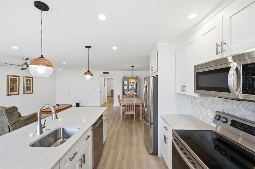 Photo of 955 Circle Drive #B, Delray Beach, FL 33445 (MLS # B26037886)