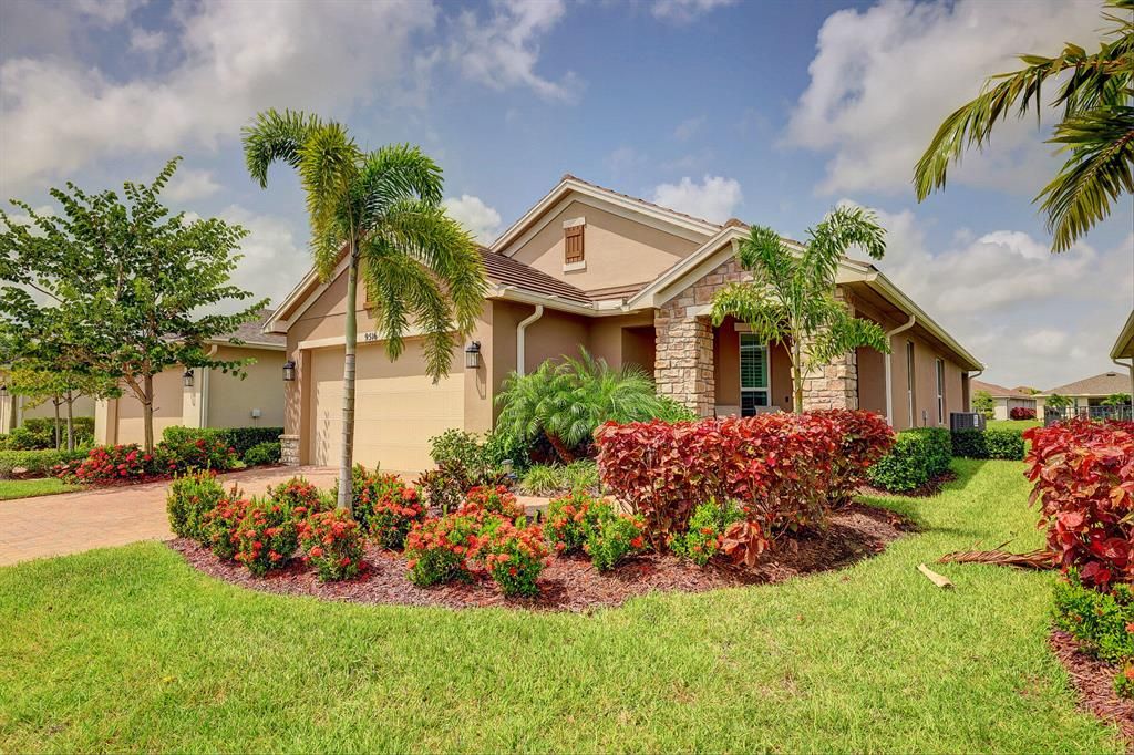 Photo of 9516 SW Royal Poinciana Drive, Port St Lucie, FL 34987 (MLS # R10820503)