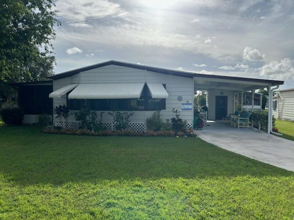 Photo of 5 Grande Camino Place, Fort Pierce, FL 34951 (MLS # R11018845)
