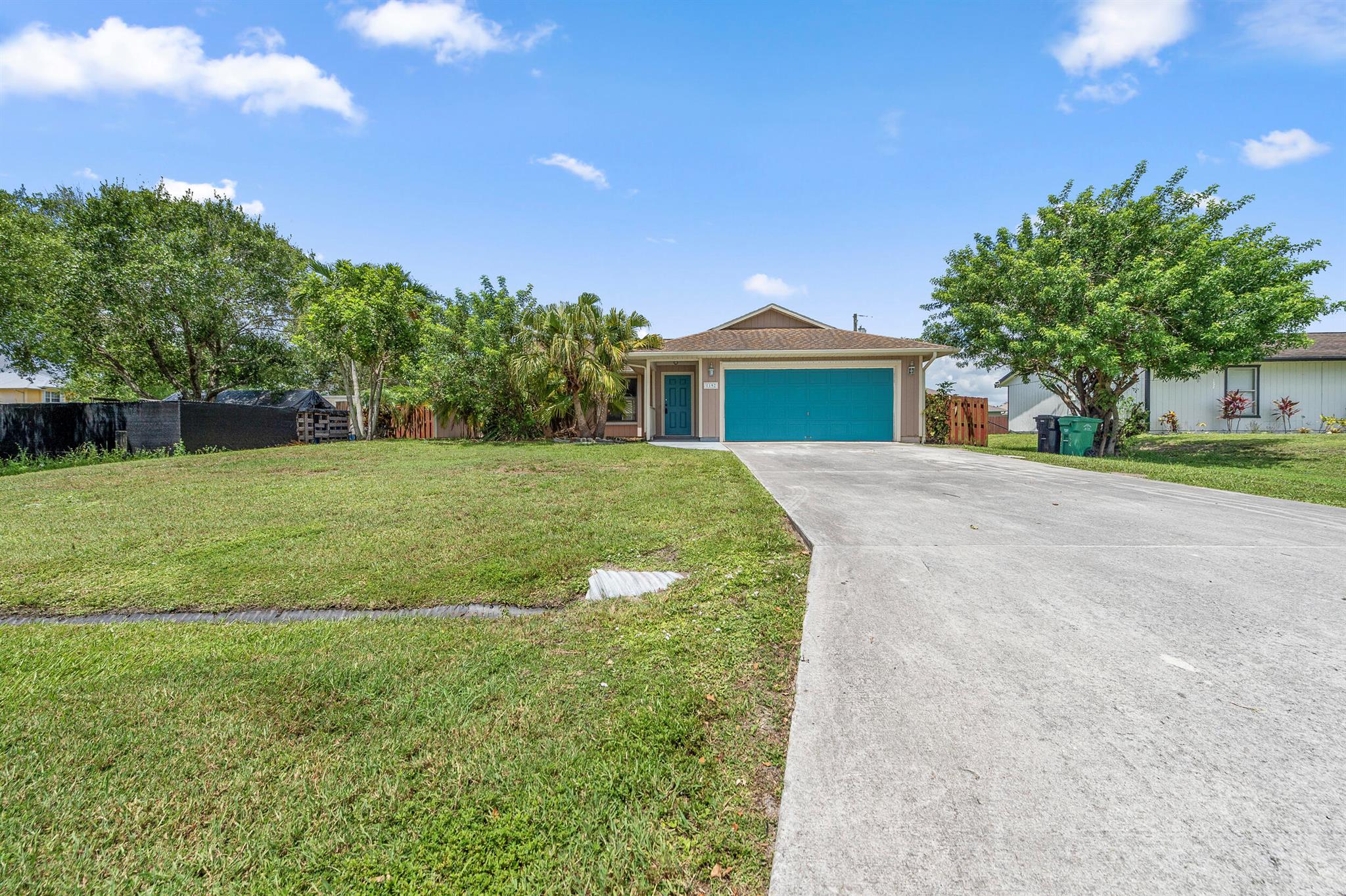 Unlock the Potential - Pool Home in Prime Port Saint Lucie Location!Welcome to 1192 SW Irving Street, a 3-bedroom, 2-bath pool home with incredible upside in one of Port Saint Lucie's most desirable and peaceful neighborhoods. Whether you're a first-time buyer ready to build equity or an investor seeking a project with major potential, this property is a rare find. Step inside and be greeted by soaring high ceilings that create a spacious, open feel throughout the main living areas. The home is filled with natural light and offers a layout that's both functional and flexible.