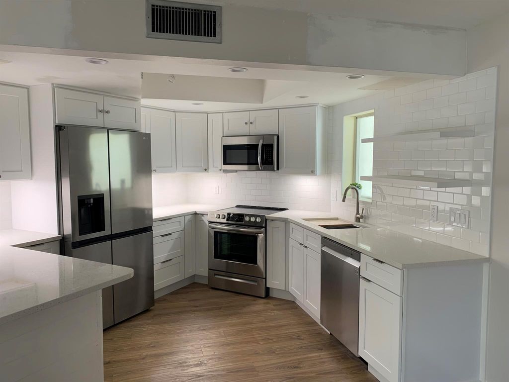 Photo of 260 Seabreeze Circle, Jupiter, FL 33477 (MLS # R11028304)