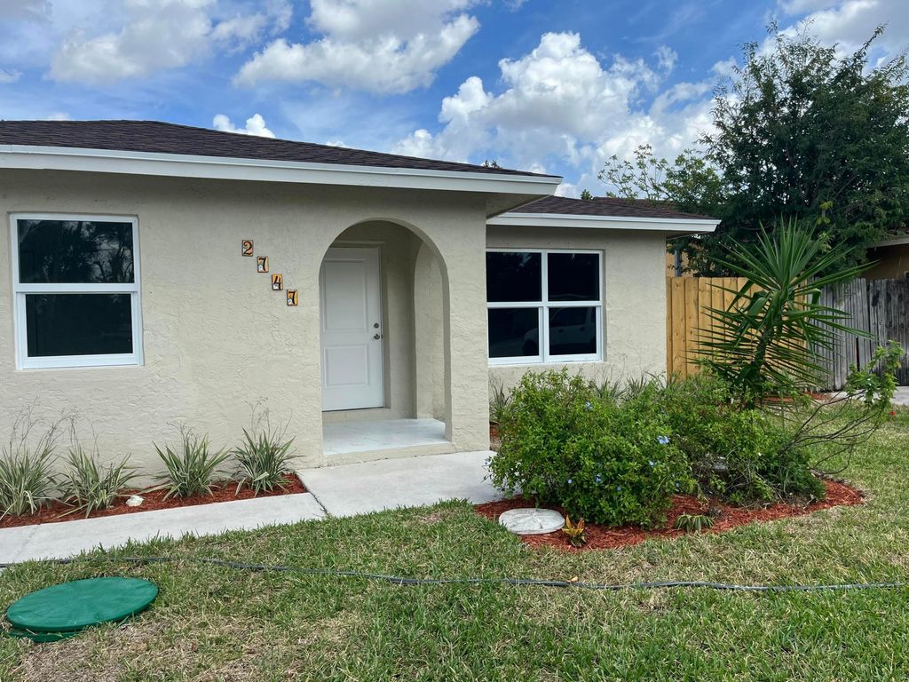 Photo of 2747 Summit Blvd, West Palm Beach, FL 33406 (MLS # B26031024)