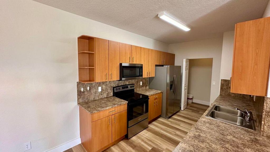 Photo of 3545 Forest Hill Boulevard #5, Palm Springs, FL 33406 (MLS # R11080630)