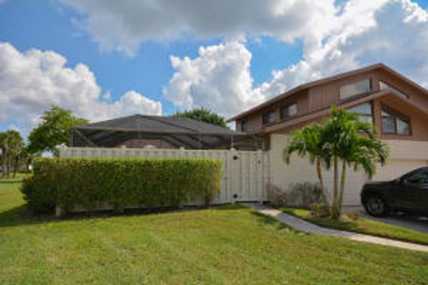 Beautiful updated Kitchen with Granite counter tops and stainless steel appliances. Light and bright with sky lights. large screened in patio. All new high quality laminate floors were installed in 2013. Great location within minutes from everything West Boca has to offer. Boca Raton Schools. This is a wonderful family neighborhood with great amenities. Second bath is currently being used for the laundry to accommodate pregnant mother. Second bedroom is a play room. No permanent changes have been made to home. Can rent directly, no waiting period. Cabana on patio does not stay.