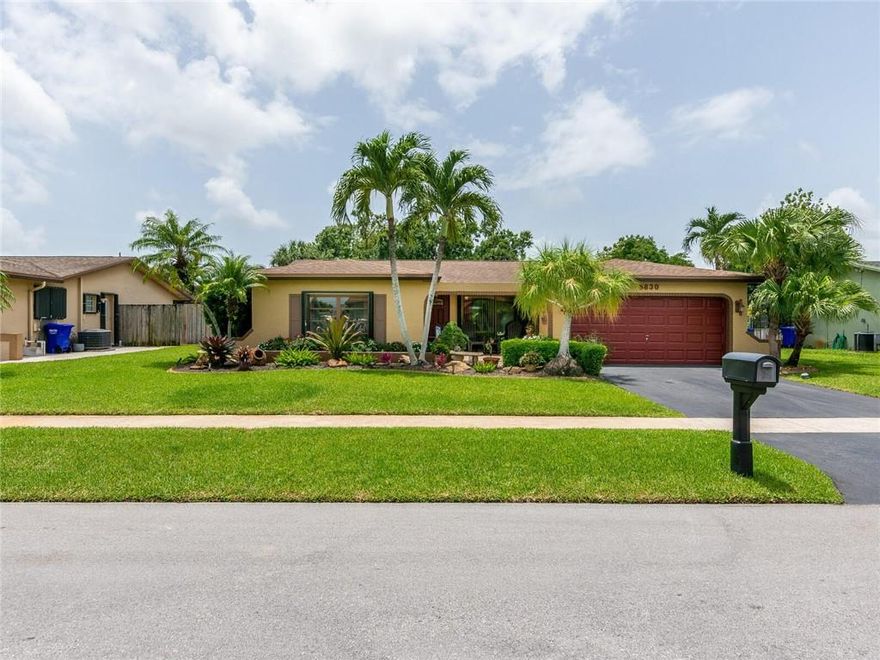 SPACIOUS 3 BEDROOM 2 BATH HOME/IMMACULATE/LUSLY LANDSCAPED FRONT AND BACKYARD/SPLIT BEDROOM PLAN/EAT-IN KITCHEN/LARGE SCREENED PATIO PERFECT HOME FOR ENTERTAINING/ACCORDION SHUTTERS