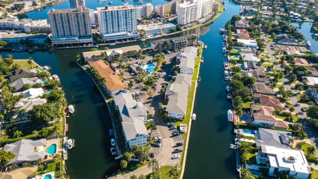Photo of 450 Paradise Isle Boulevard, Hallandale Beach, FL 33009 (MLS # B26044993)
