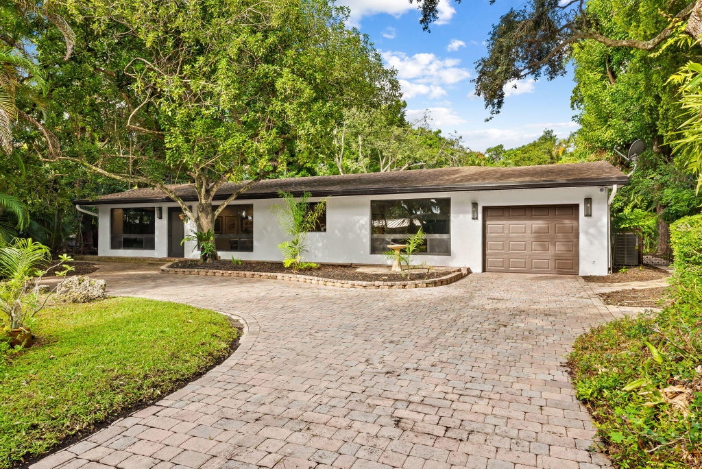 Photo of 2643 SW 30TH Terrace, Fort Lauderdale, FL 33312 (MLS # B26088176)