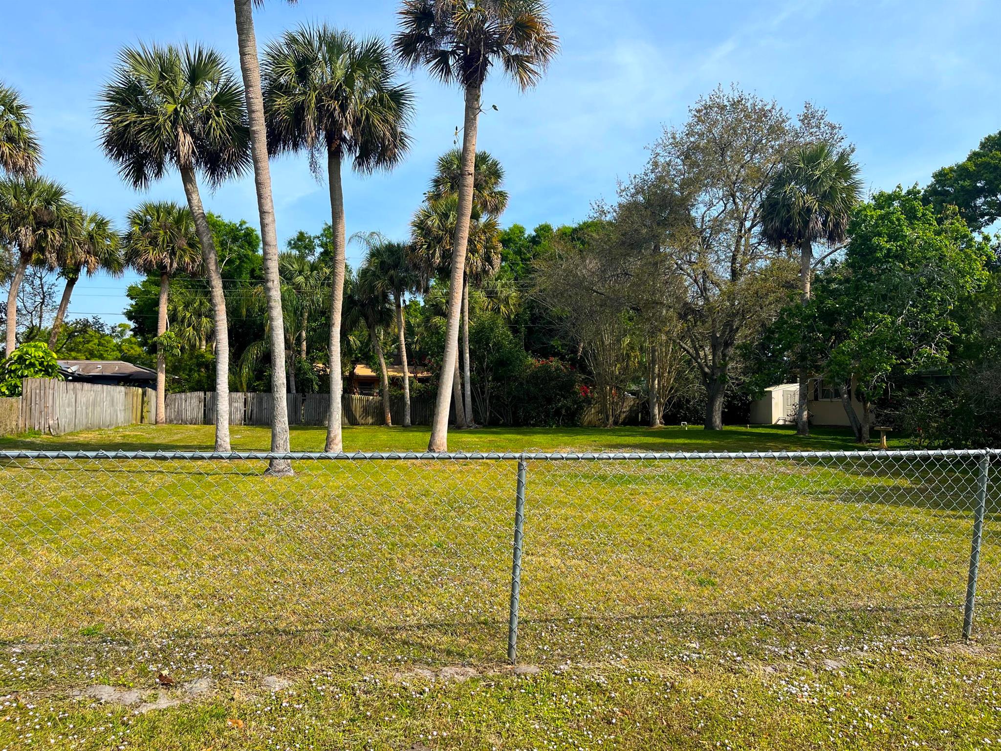 Are you in search of a lot in South Florida? Consider this spacious lot nestled in the serene Lakewood Park community, offering over a quarter of an acre of land with well-maintained grass and palm trees, ideal for realizing your dreams. Residents here enjoy easy access to gas stations, restaurants, coffee shops, a library, and groceries. Additionally, the lot's convenient location just 3 miles from both US 1 and I-95 simplifies exploration of nearby places. For leisure and relaxation, residents can take a short trip to Jetty Park and the beach, only 10 miles away. The Lakewood Park Property Owners' Association oversees maintenance of the community's entrances and common areas, green spaces, lakes, and park areas. $75 for the year voluntary-Check out Lakewood Park POA.