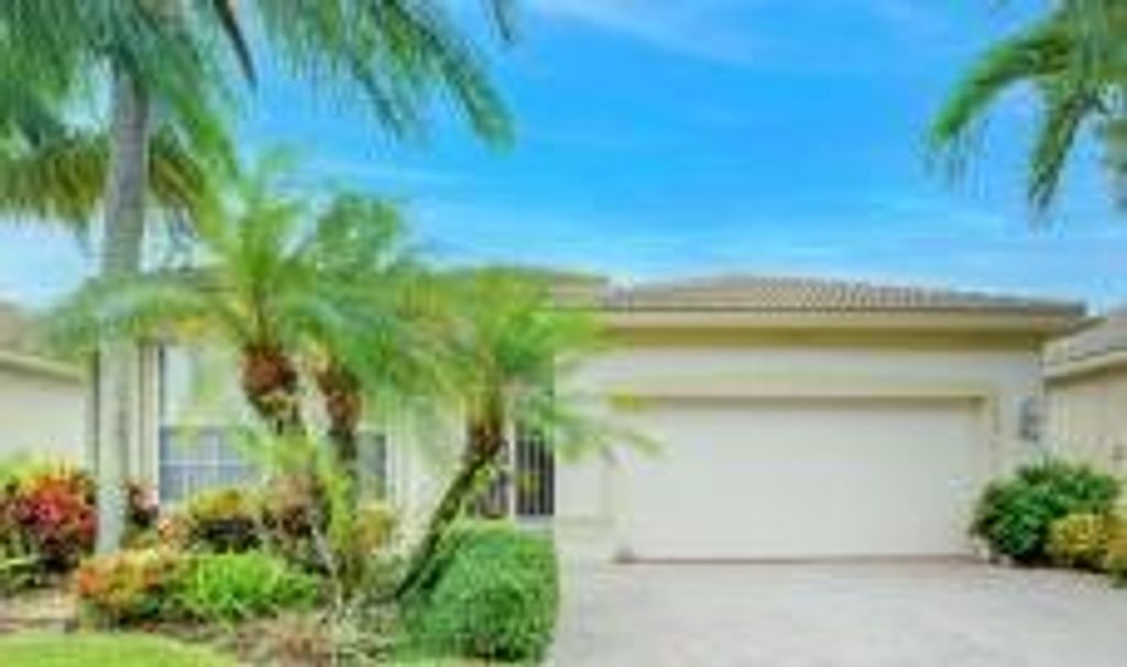 Photo of 7937 Oaklawn Cove Cv, Lake Worth Beach, FL 33467 (MLS # R10729420)