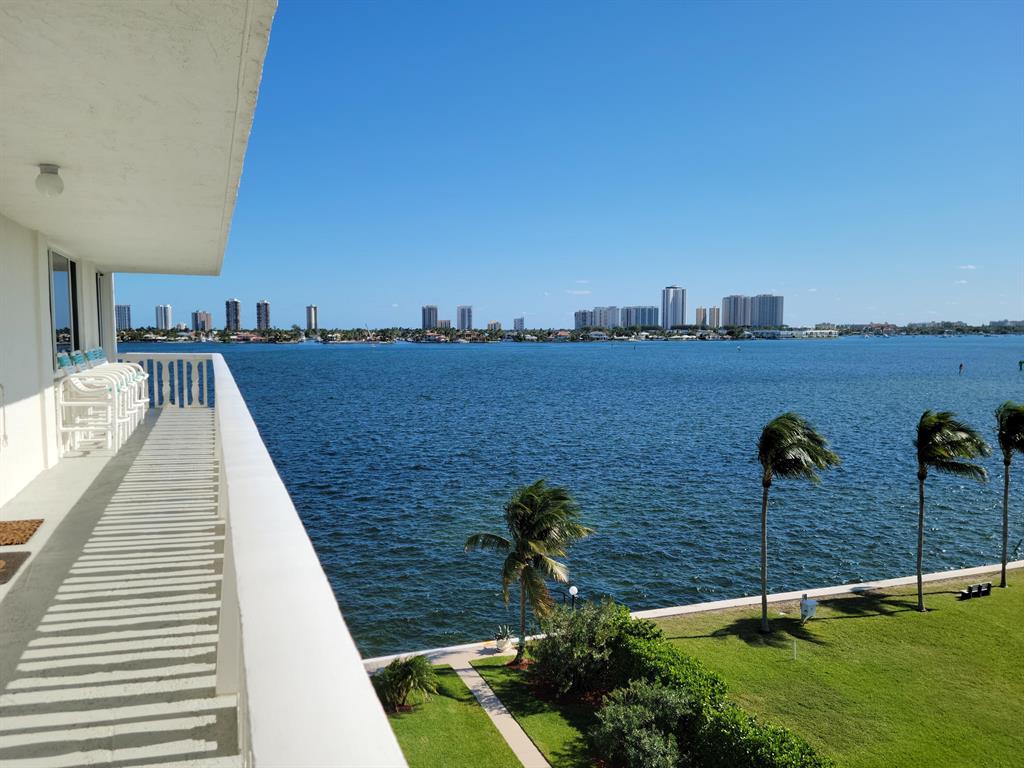 Wake up to the sun rising over Singer Island and the Intracoastal everyday in this spacious corner unit with an open balcony. Upgraded apartment is ready for immediate occupancy. Large bedrooms, fully tiled with modern fixtures and stainless steel appliances. Granite counters. Brand new, high efficiency A/C unit. Gated building with reserved parking under the building and heated pool. Laundry in unit. Large closets in the bedrooms. Great access to boating, dining, shopping and beaches. Adjacent to the Lake Park Marina and Nautilus 220, currently under construction. Million dollar location and views can't be beat in this price range. Building is well maintained with new elevators and exterior catwalks. If needed, furniture is negotiable.