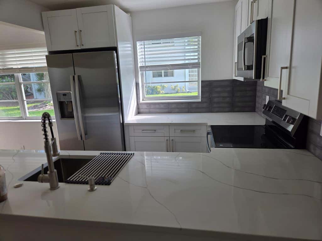 Photo of 205 ELLESMERE E #205, Deerfield Beach, FL 33442 (MLS # B26064617)