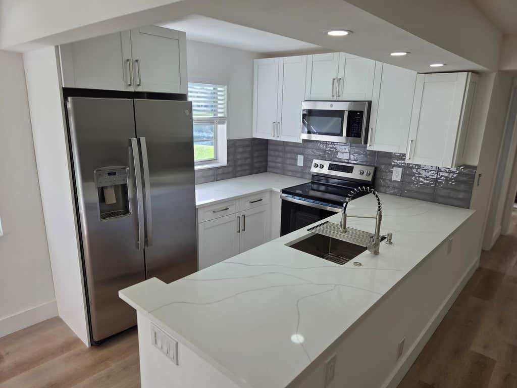 Photo of 205 ELLESMERE E #205, Deerfield Beach, FL 33442 (MLS # B26064617)