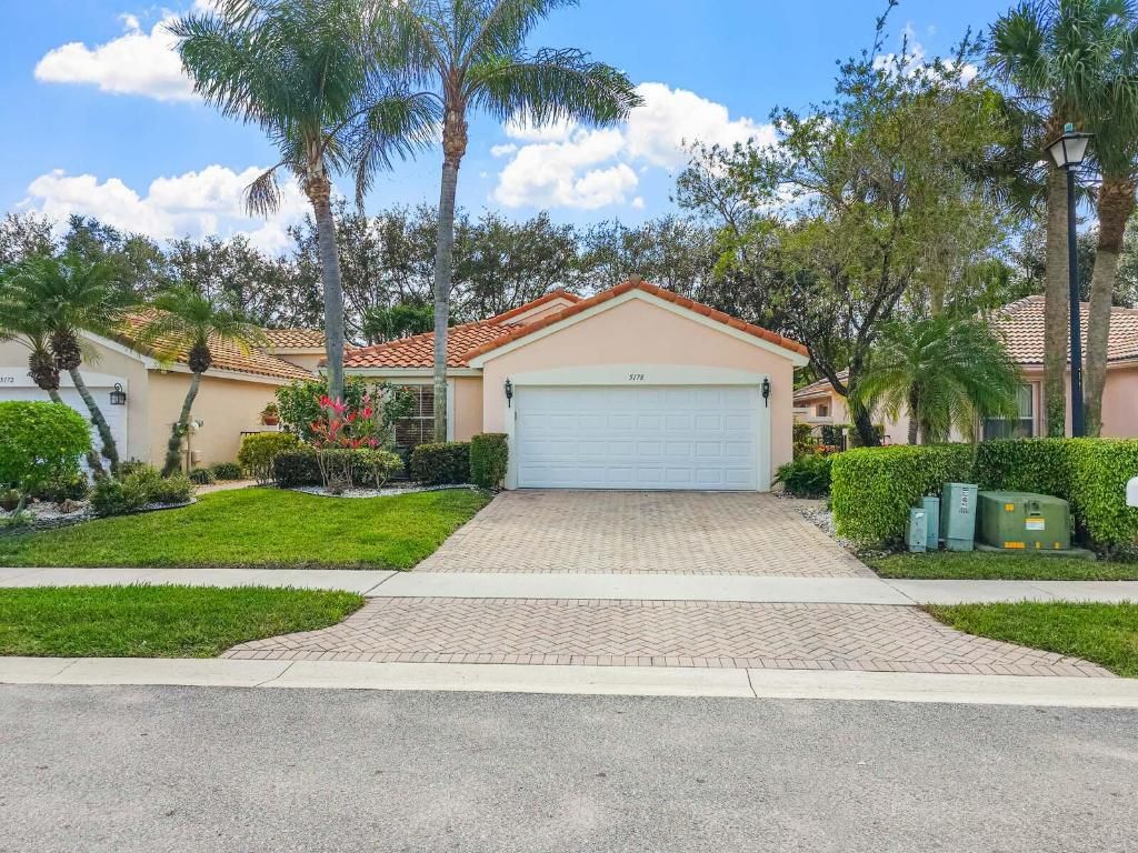 Photo of 5178 Pelican Cove Drive, Boynton Beach, FL 33437 (MLS # R11154829)