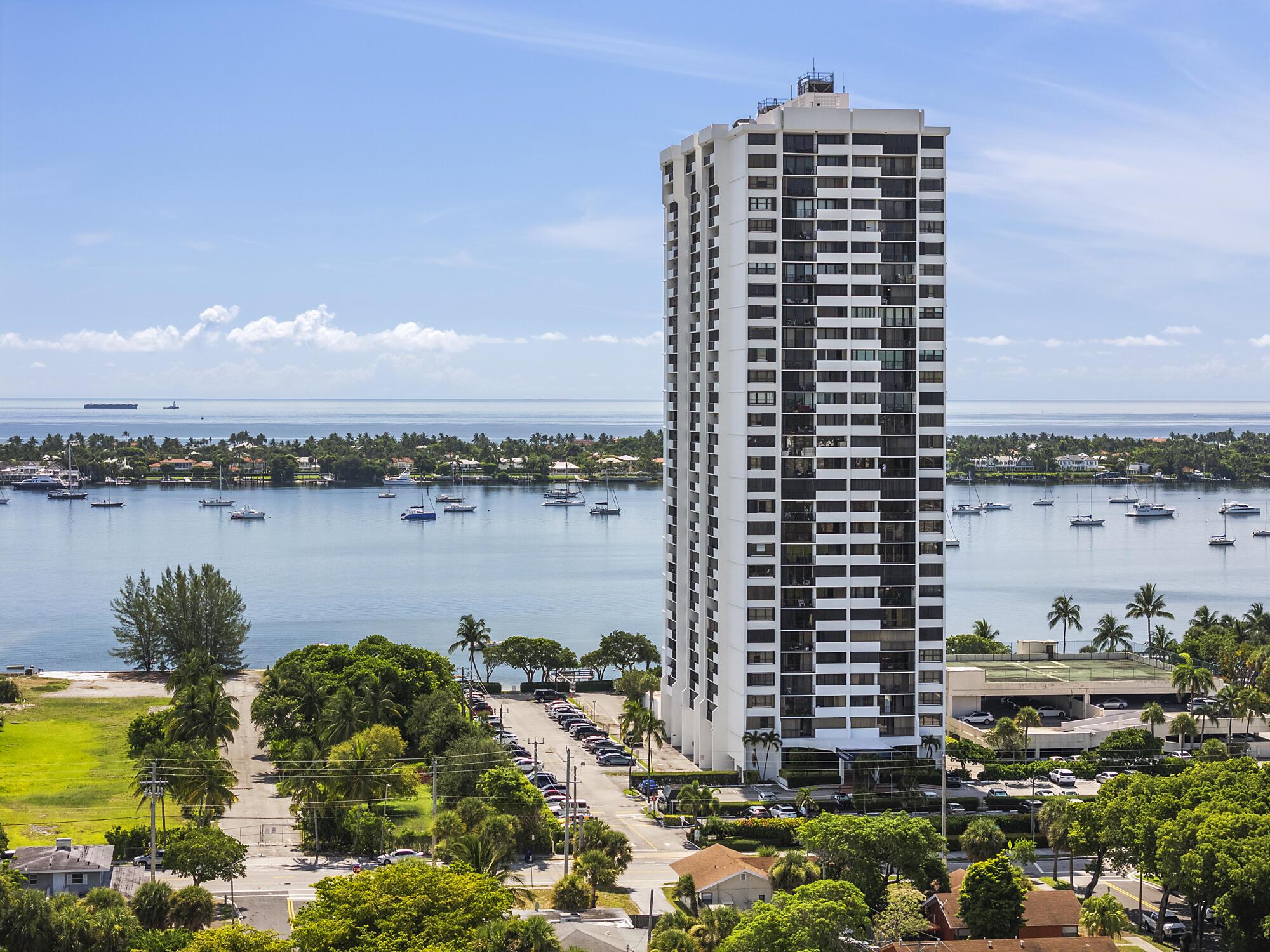 Enjoy gorgeous water views from this spacious 1 bedroom 1.5 bath condo with an expansive balcony overlooking the Intracoastal, Peanut Island & ocean views! Impact windows and sliders! Where else are you going to find a condo with these views at this price?! Located a few miles north of downtown WPB and easy access to Palm Beach. Tennis courts being redone with Pickle Ball courts being added! Investors welcome since you can rent out immediately!