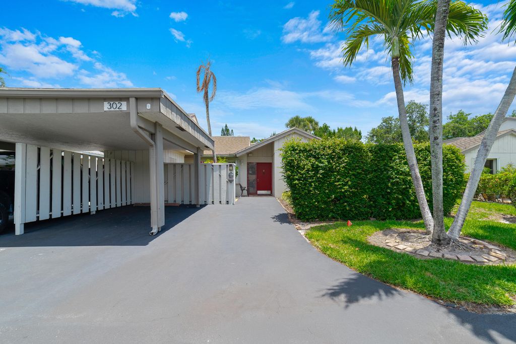 Photo of 302 Deer Creek Wildwood Lane E, Deerfield Beach, FL 33442 (MLS # B26031229)