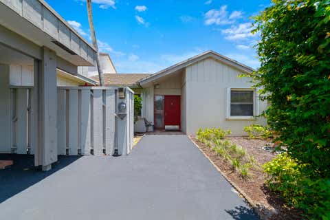 Photo of 302 Deer Creek Wildwood Lane E, Deerfield Beach, FL 33442 (MLS # B26031229)