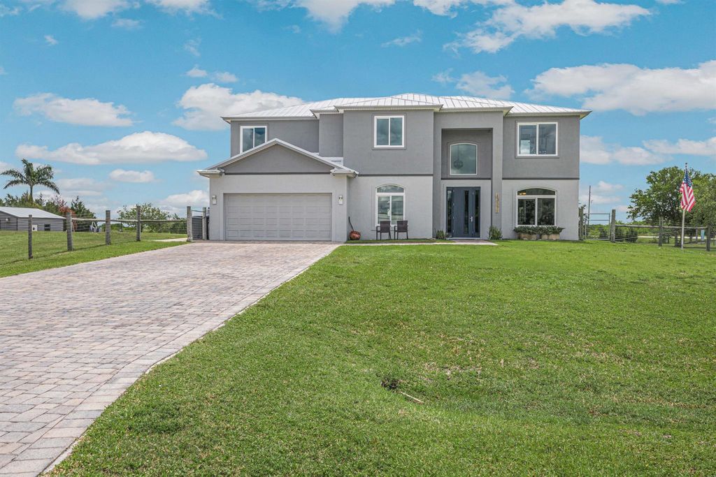 Photo of 12374 Piper Cub Terrace, Port St Lucie, FL 34987 (MLS # R10893100)