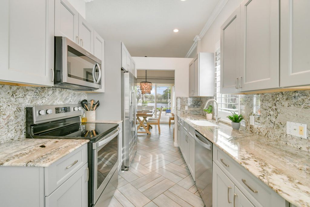 Photo of 1021 Bedford Avenue, Palm Beach Gardens, FL 33403 (MLS # R10949066)
