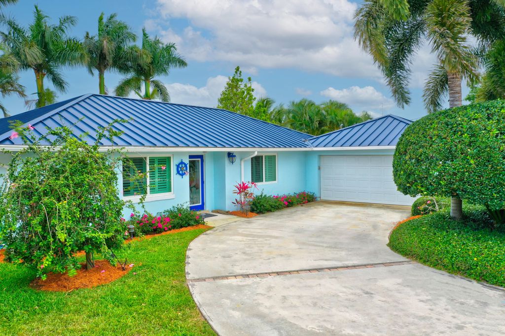 Photo of 1334 SW Egret Way, Palm City, FL 34990 (MLS # R10791286)