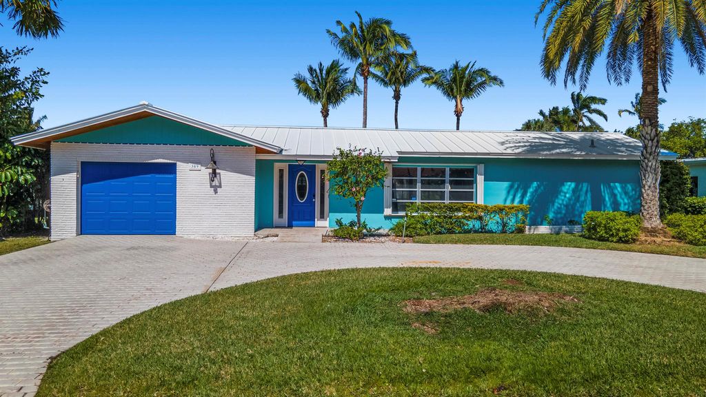 Photo of 309 Claremont Lane, Palm Beach Shores, FL 33404 (MLS # R10962654)