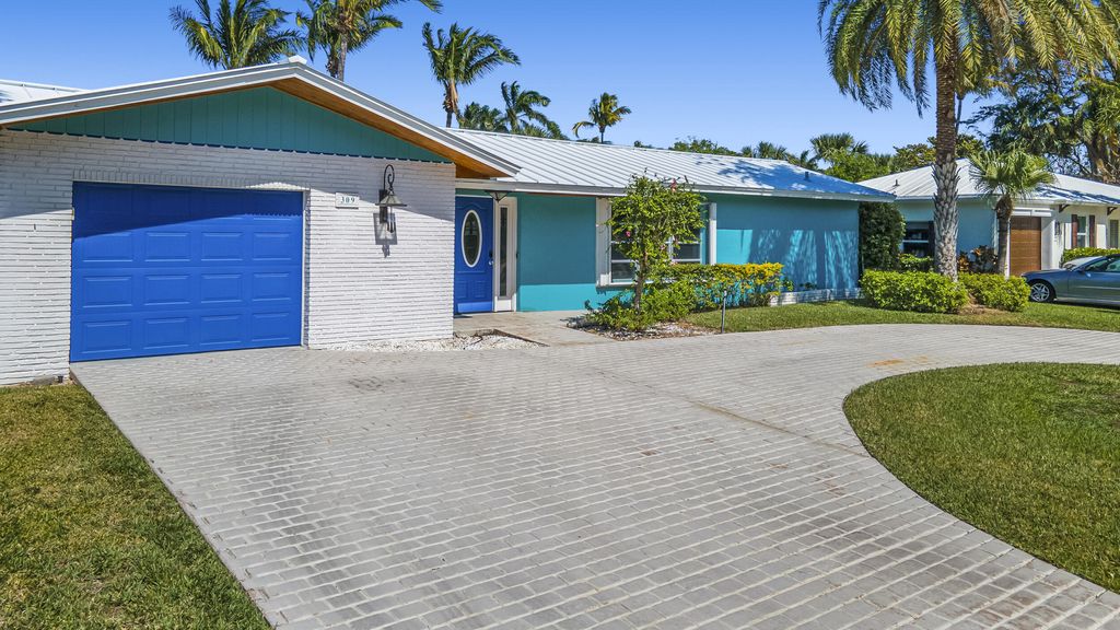 Photo of 309 Claremont Lane, Palm Beach Shores, FL 33404 (MLS # R10962654)