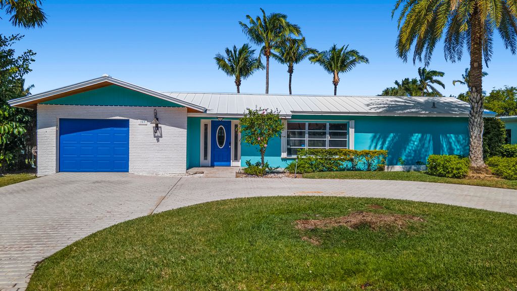 Photo of 309 Claremont Lane, Palm Beach Shores, FL 33404 (MLS # R10962654)