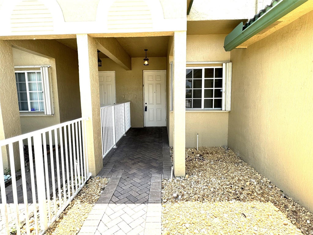 Photo of 7953 Exeter Boulevard #102, Tamarac, FL 33321 (MLS # F10455581)