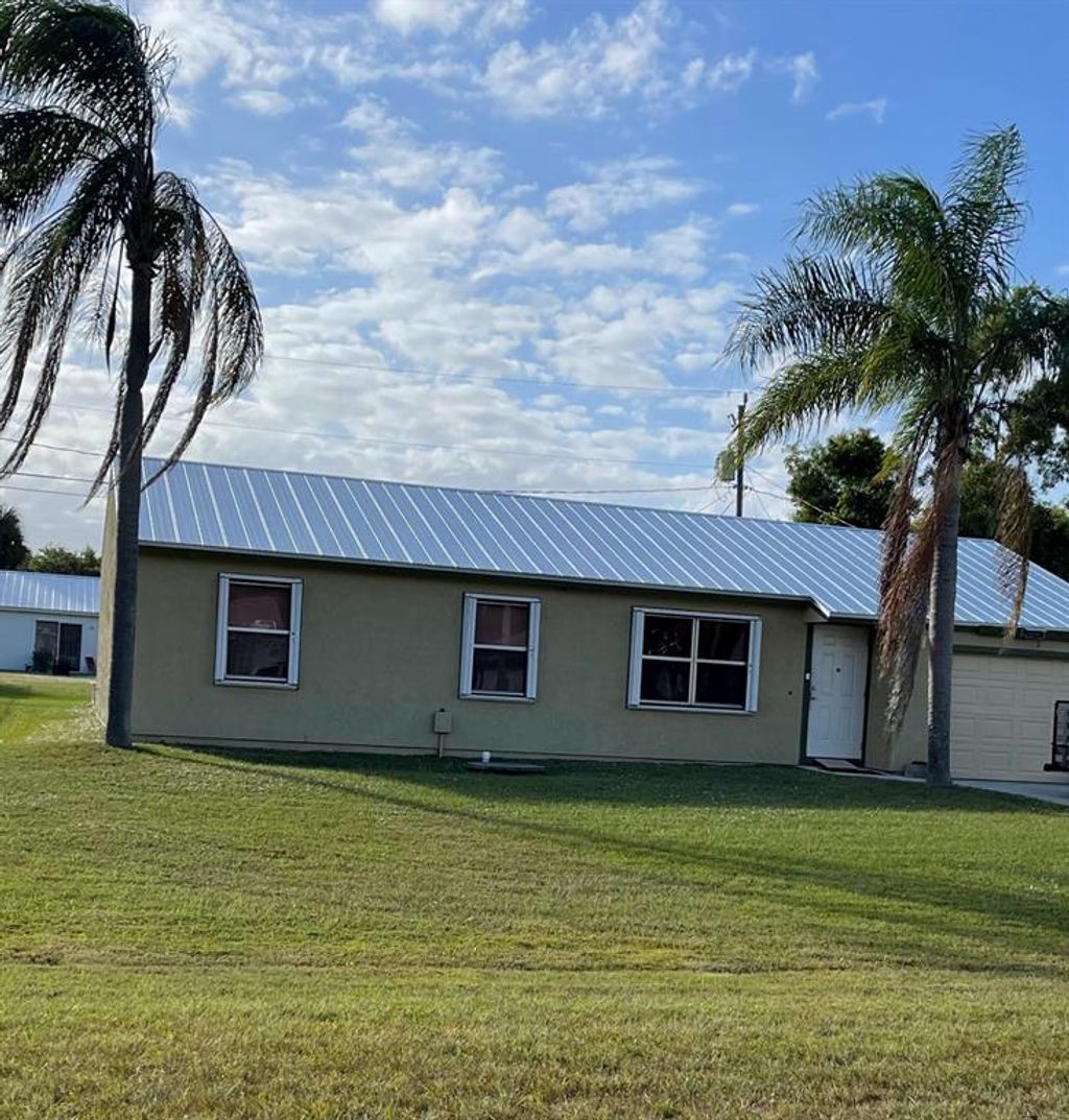 Photo of 2252 SE Berkshire Boulevard, Port Saint Lucie, FL 34952 (MLS # R10758972)