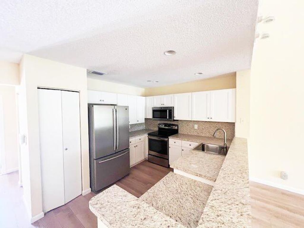 Photo of 22376 Cypress Wood Lane, Boca Raton, FL 33428 (MLS # R11008665)