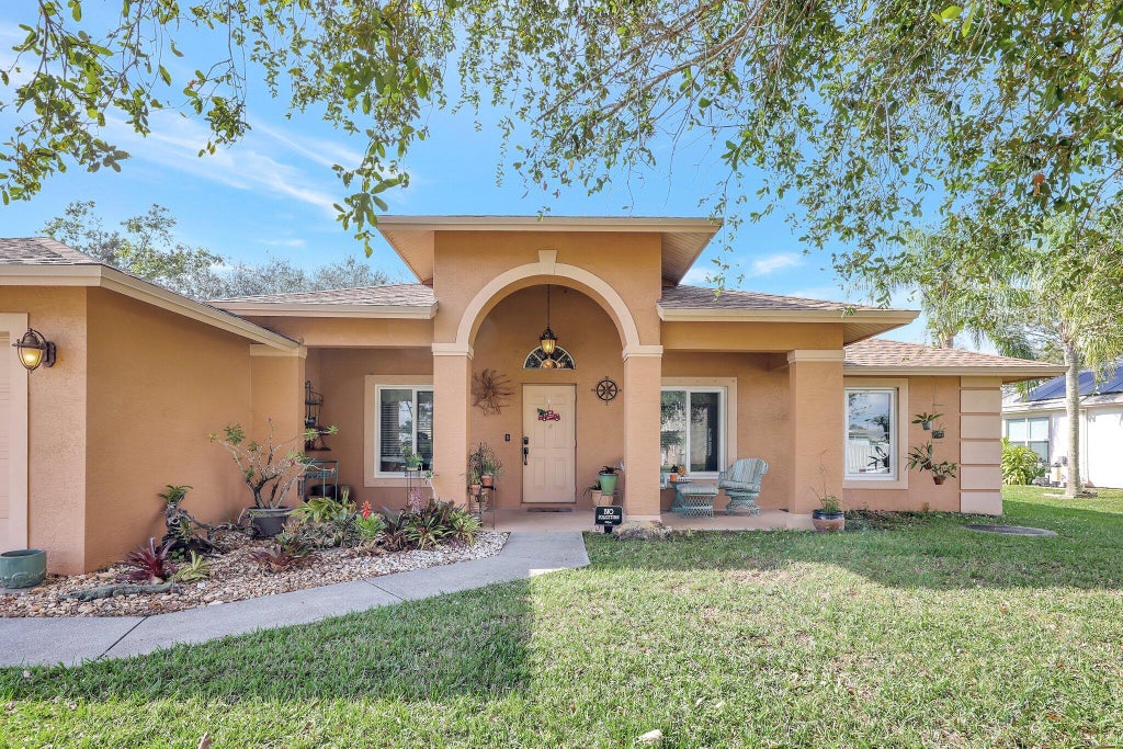 Photo of 3598 SW Zullo Street, Port Saint Lucie, FL 34953 (MLS # R11048384)