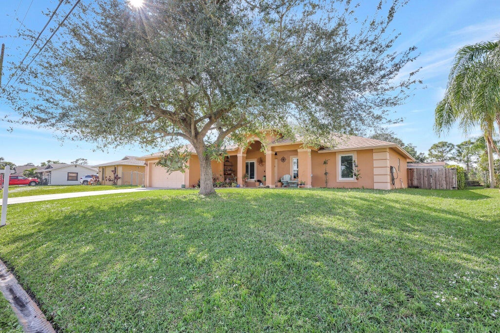 Photo of 3598 SW Zullo Street, Port Saint Lucie, FL 34953 (MLS # R11048384)