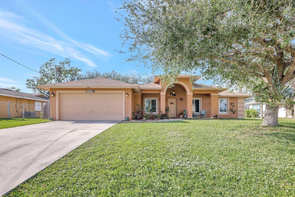Photo of 3598 SW Zullo Street, Port Saint Lucie, FL 34953 (MLS # R11048384)