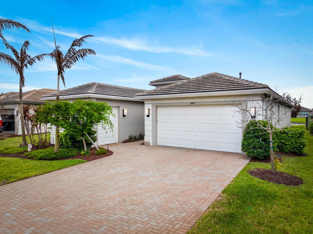 Photo of 11949 SW Coral Cove Parkway, Port Saint Lucie, FL 34987 (MLS # B26021168)