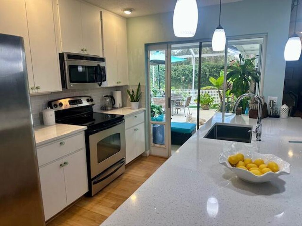 Photo of 9303 Chapman Oak Court, Palm Beach Gardens, FL 33410 (MLS # R11141587)