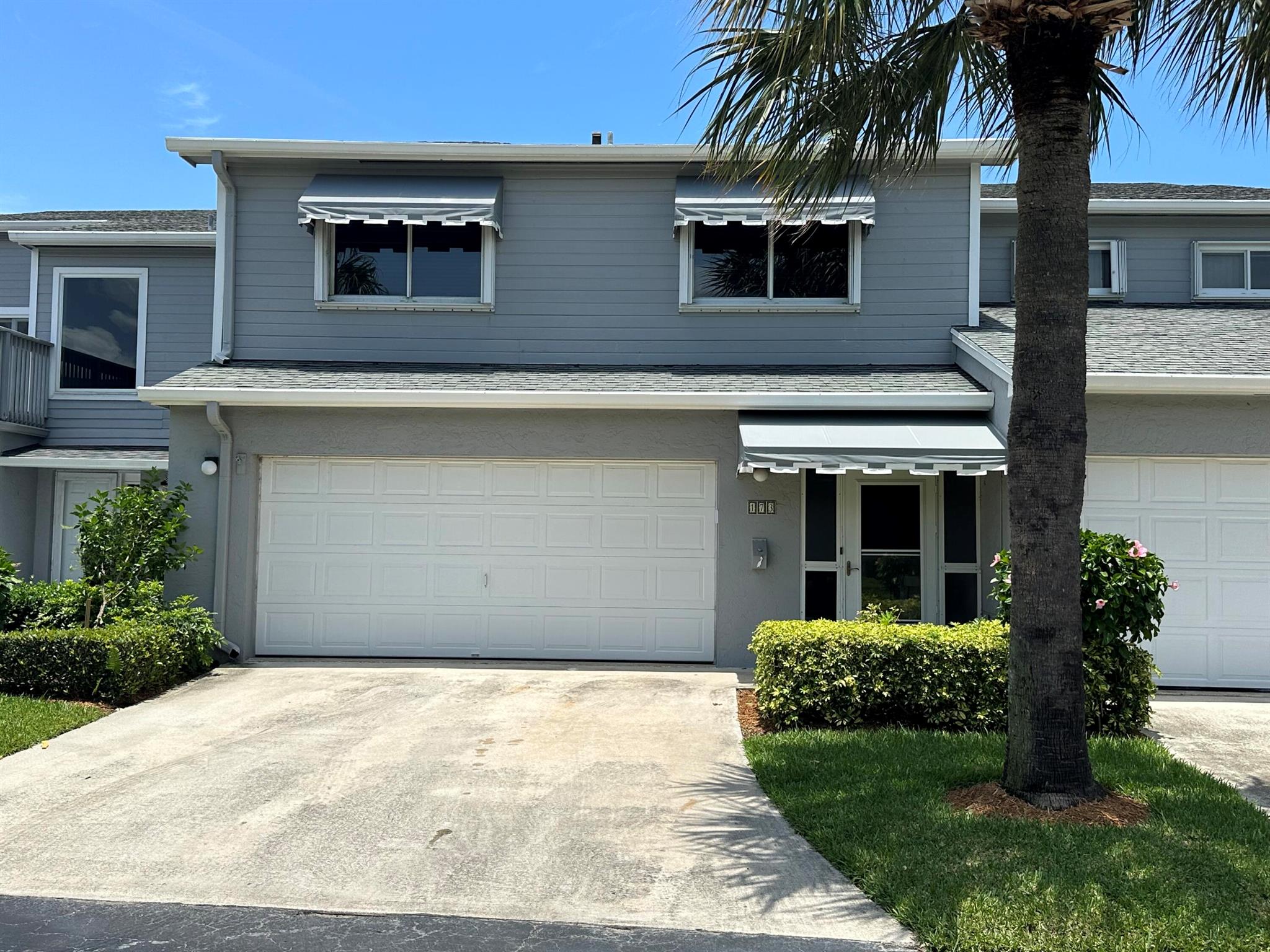 Ocean, Beach, pool, tennis, gated community, shuffleboard. Steps from private beach walkway. This lovey condo has 3 Bedrooms and 2.5 Bathrooms. Laundry Room and 2 Car Attached Garage. Lovely deck overlooking the pond with fountain. Has large bedrooms, new paint, floorings and updates throughout. Quiet community yet close enough to everything! Relocating??? This is a perfect option! Tenant pays electric, cable internet. Water and garbage and amenities are included in rent. Call today for private showing.