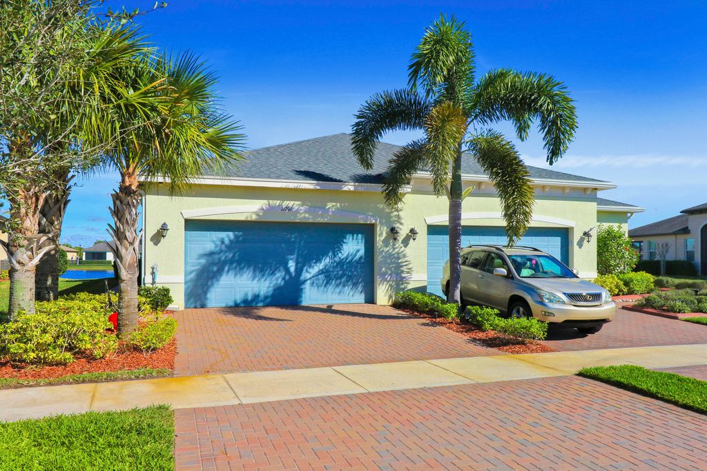 Photo of 11201 SW Winding Lakes Circle, Port Saint Lucie, FL 34987 (MLS # R10956452)