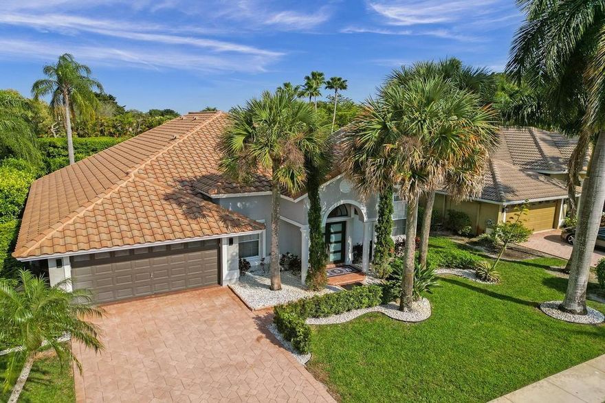 Back On The Market! Sought after West Boca Community with A Rated Schools.  This Home has been Totally Renovated. Brand New Kitchen with Quartz Counter Tops, Wine Bar and Top of the Line Appliances. Brand New AC Unit. 24 x 24 Modern Porcelain Tile Floors Throughout. Master Bedroom has Two Walk In Closets with New Bathroom & Floating Tub. The House has a Completely Open Floor Plan with High Ceilings and Upgraded Led Ceiling Lighting Throughout the House. Accordion shutters on all windows & sliders. Newer Impact Hurricane Rated Front Doors. Newer Roof. The Backyard has White Upgraded Marble Pavers, Jacuzzi Tub, Outside Built In Grill, & a Landscaped Fenced in Totally Private Yard with ROOM FOR A POOL.. Come See This One of A Kind Property with All The Bells And Whistles, It Won't Last Long!